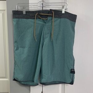 Oakley Teal and Gray Striped Apparel